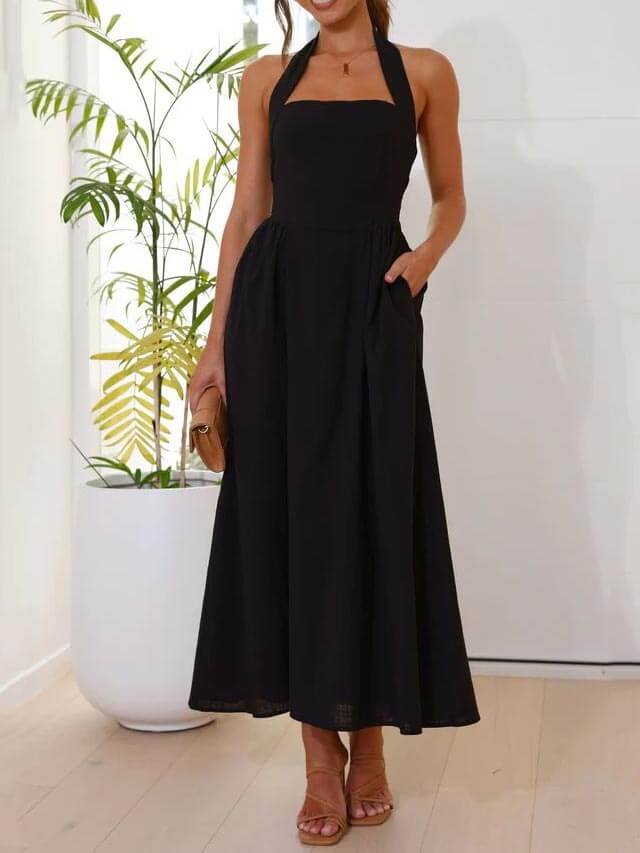 Vestido negro de cuello halter con cintura pequeña y largo medio