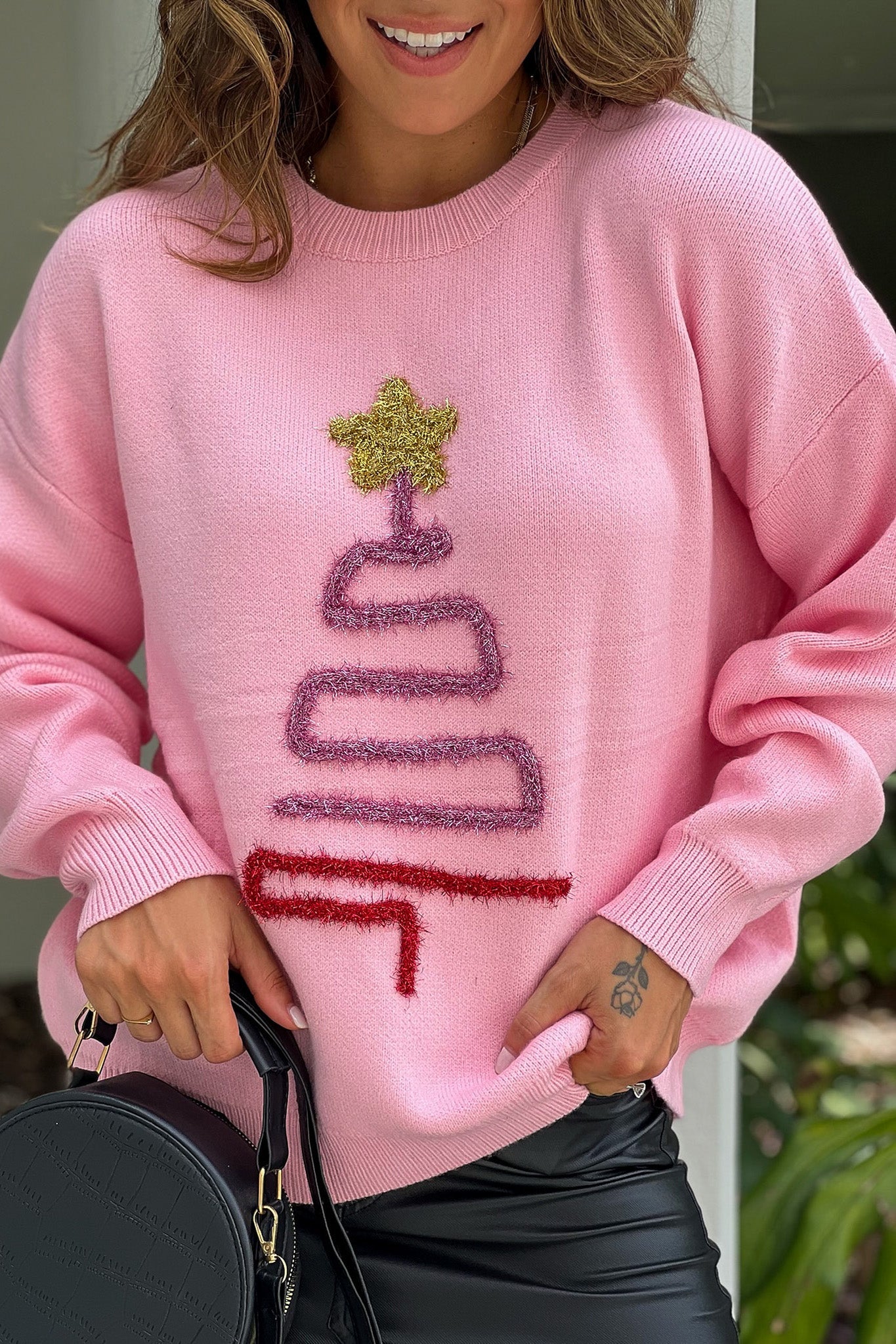 Pull rose scintillant en forme d'arbre de Noël